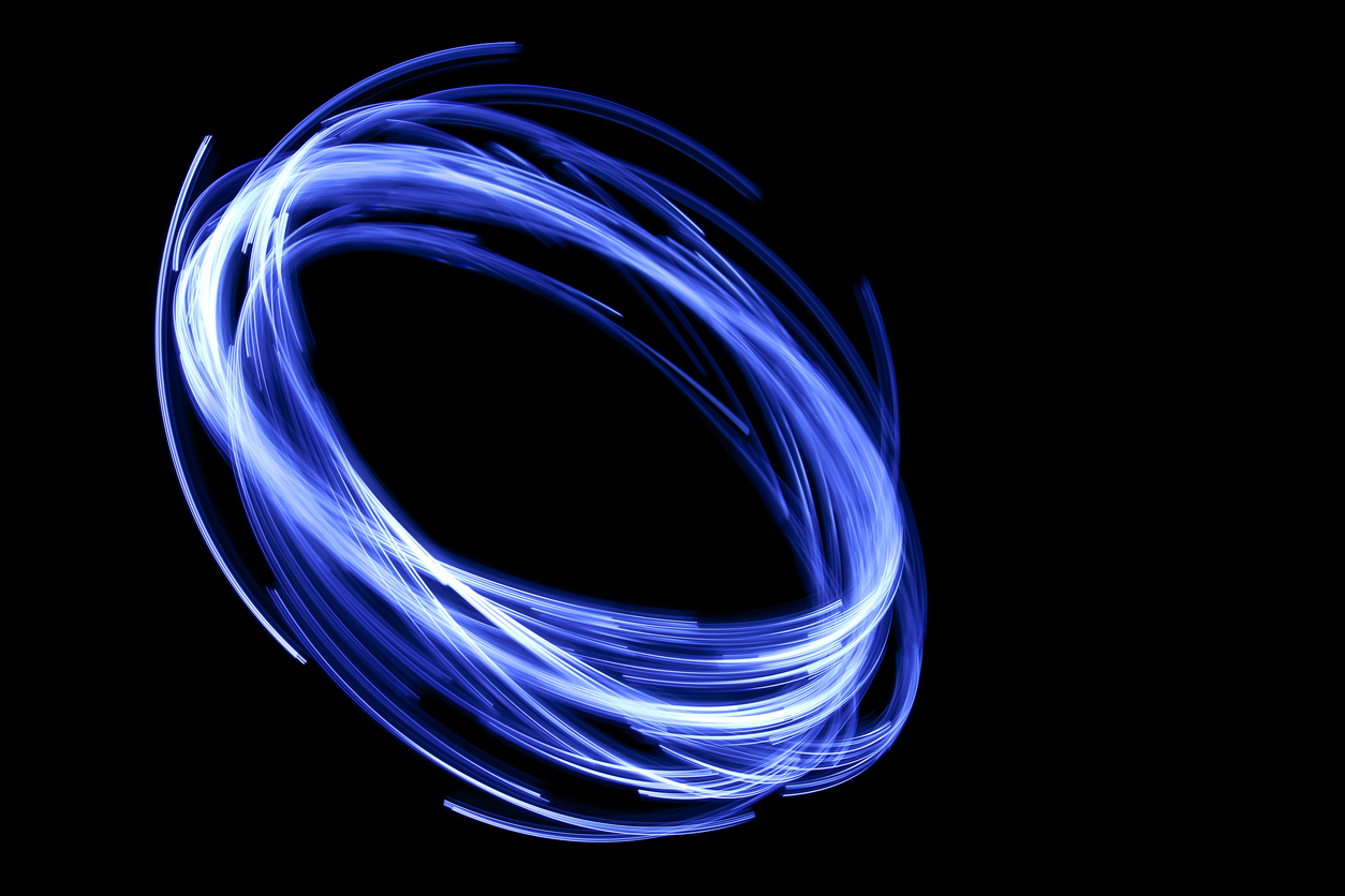 glowing circular blue, long exposure of creative light painting